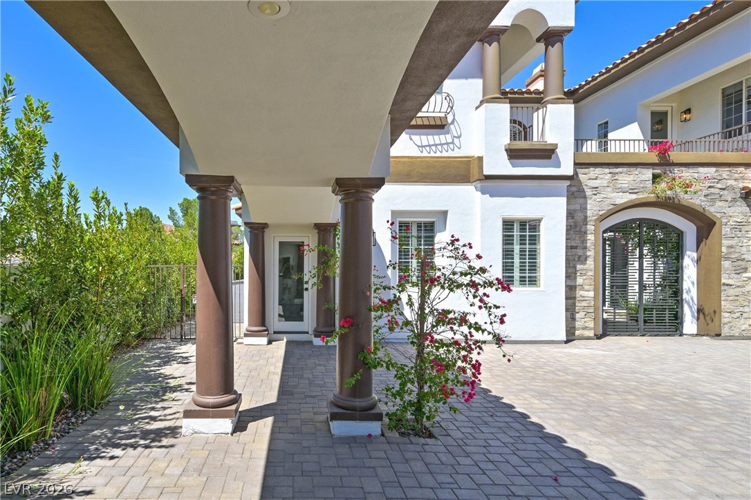 6 Rue Du Ville Henderson, NV 89011 - Photo 86 of 99 This charming home features stately columns and a beautifully paved driveway, inviting you inside.