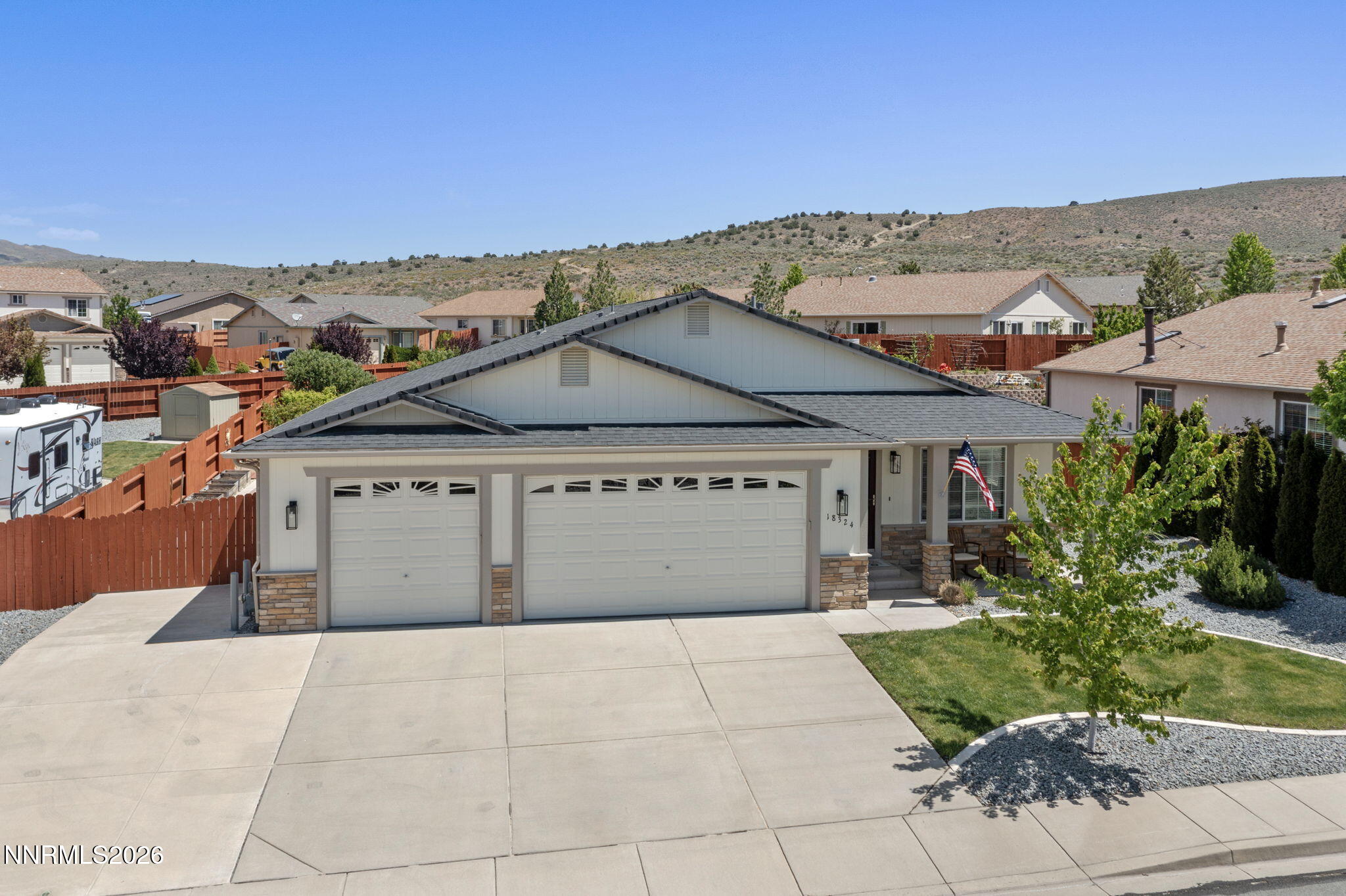 18324 Panda Bear Court Reno, NV 89508 - Photo 29 of 44 a view of a house with a garden