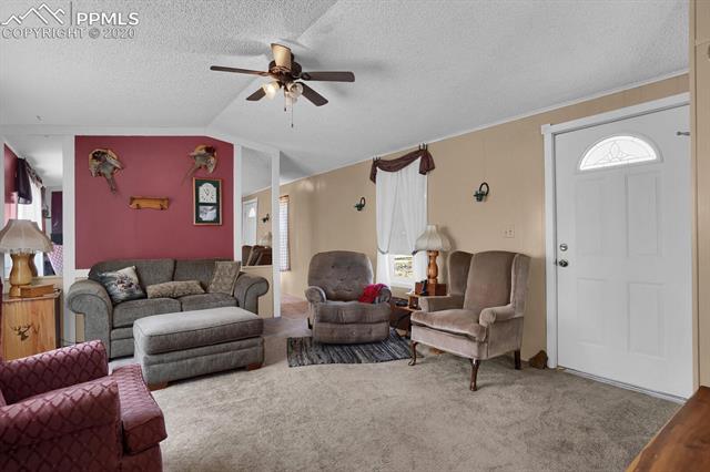 4685 South Yoder Road Yoder, CO 80864 - Photo 7 of 32 Main entry opens up to the living room.