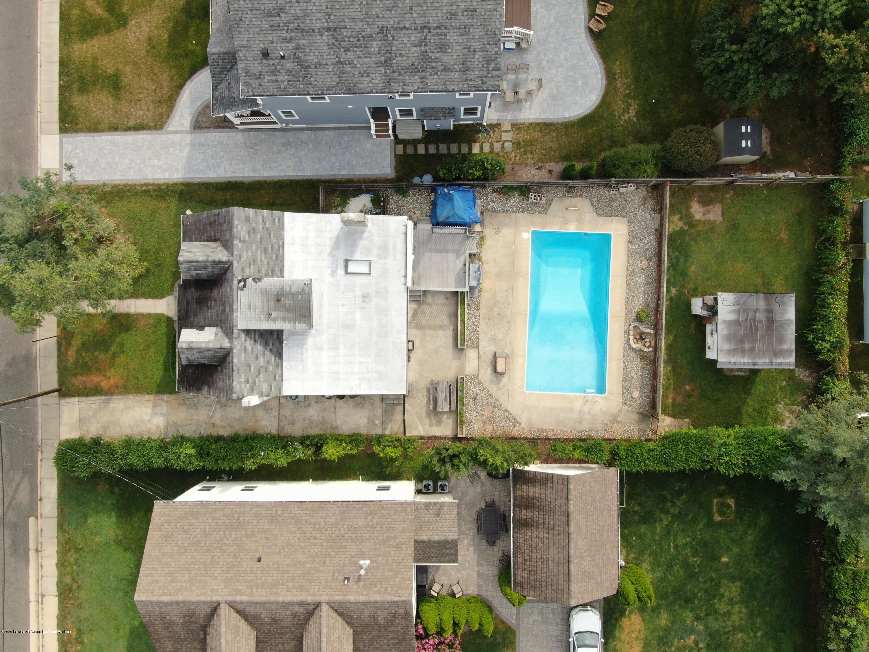717 Ocean Road Spring Lake Heights, NJ 07762 - Photo 3 of 24 an aerial view of a house with a yard