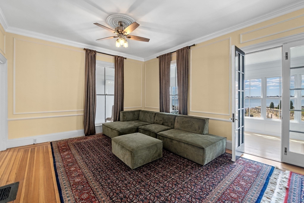 90 Puritan Road Swampscott, MA 01907 - Photo 14 of 42 a living room with furniture and a rug
