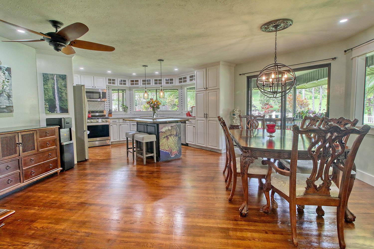 6581 Puupilo Road Kapaa, HI 96746 - Photo 10 of 24 a view of a dining room with furniture window and wooden floor