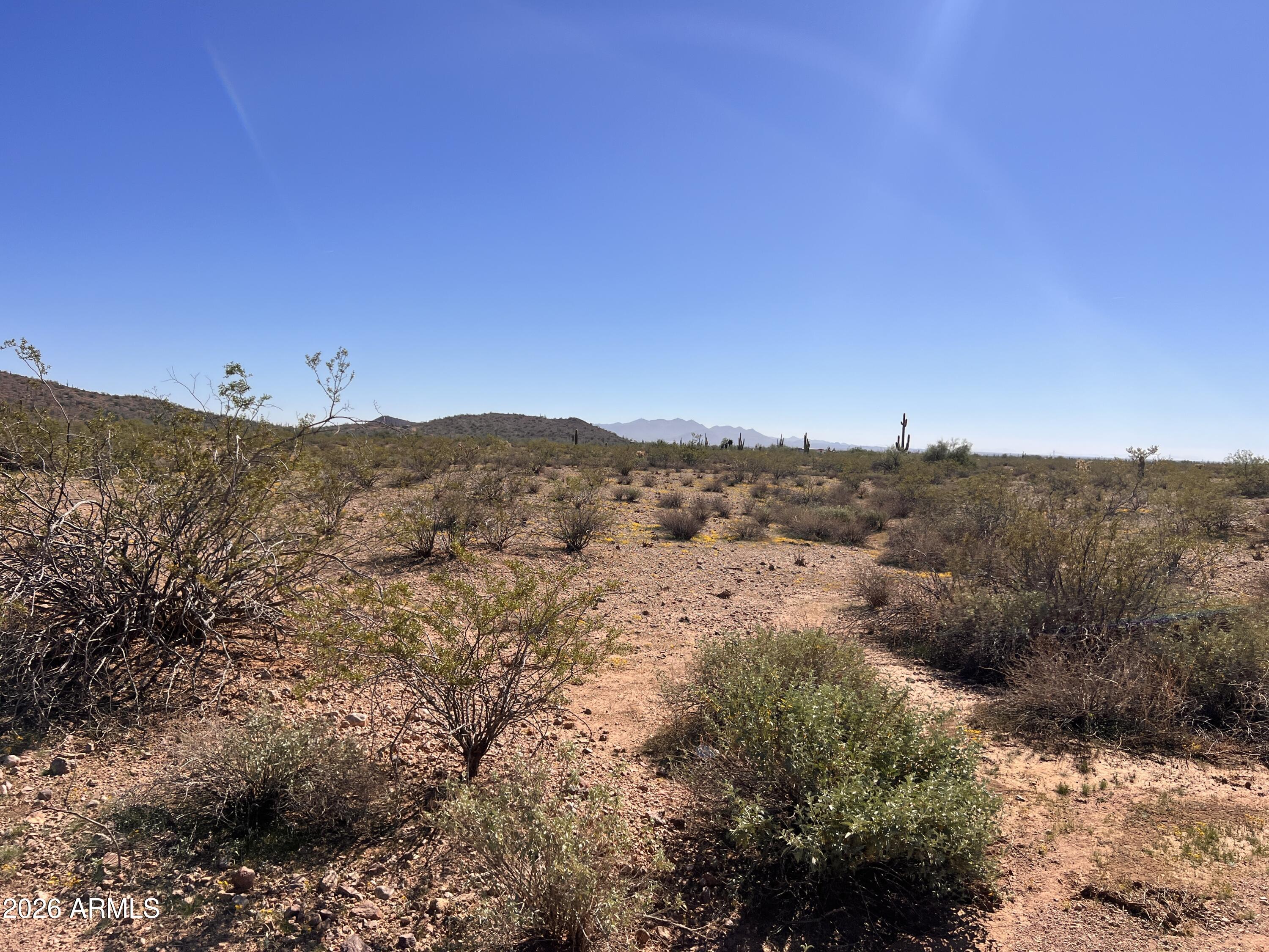 31-xxx West Carlise Road, Unit 105 Wittmann, AZ 85361 - Photo 1 of 9 a view of mountains and valleys