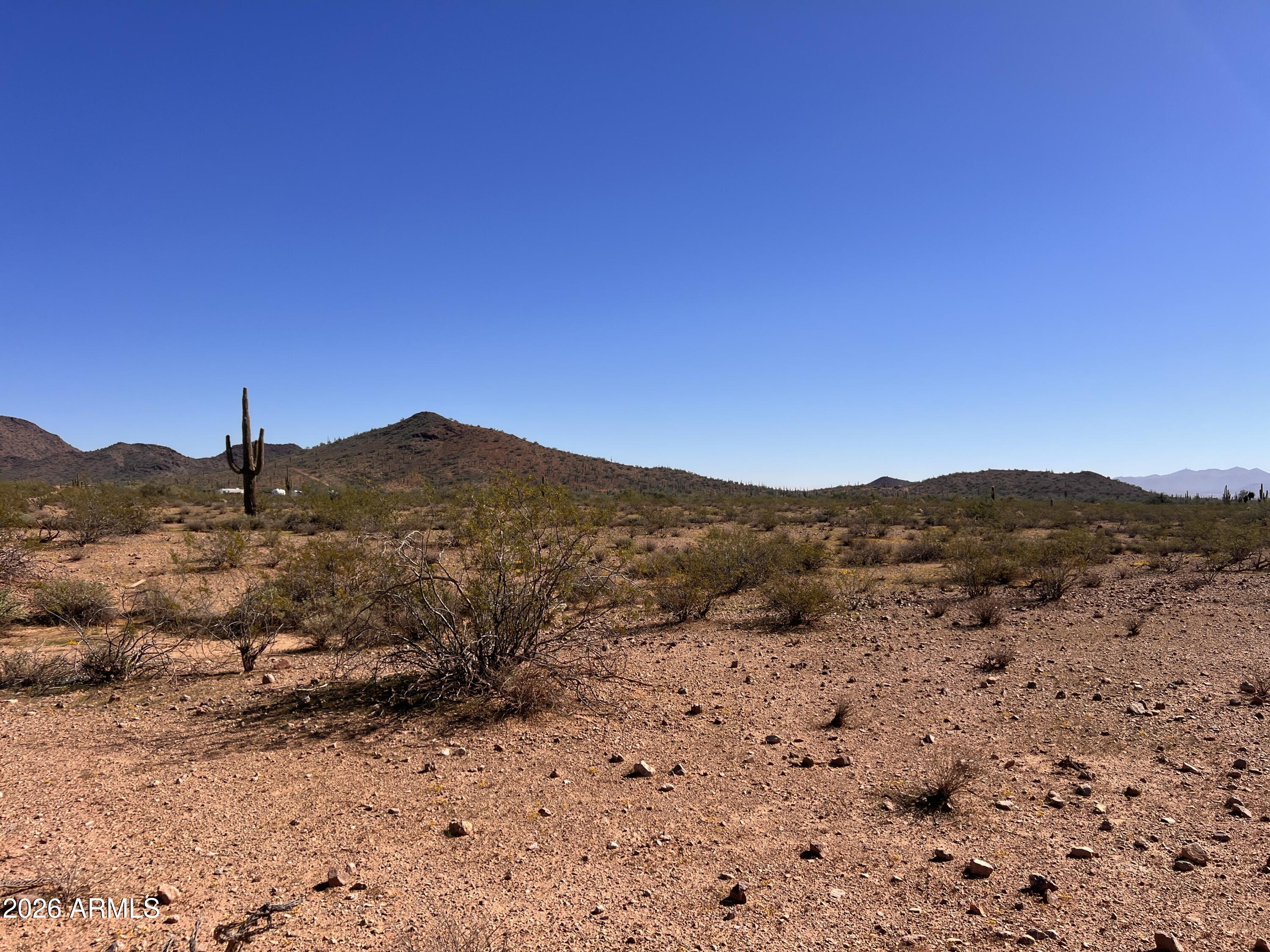 31-xxx West Carlise Road, Unit 105 Wittmann, AZ 85361 - Photo 8 of 9 a view of mountain and a mountain view