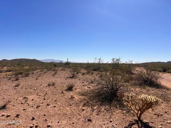 a view of mountains and valleys