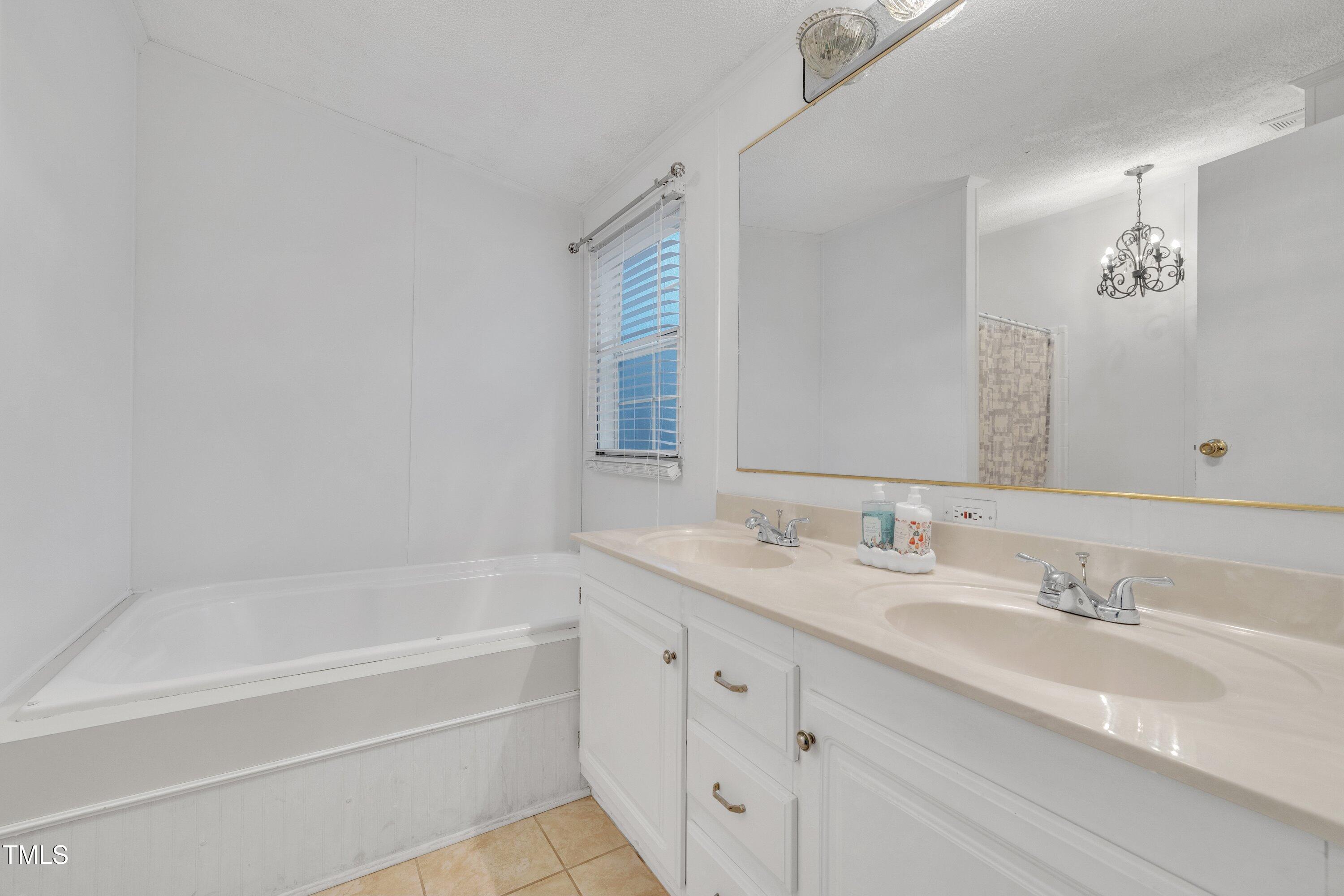 8412 South Creek Road Willow Spring, NC 27592 - Photo 14 of 29 Primary Bath