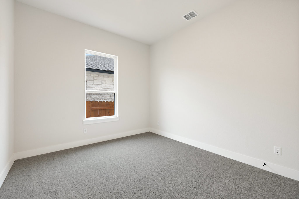 6313 Leftwich Cove Austin, TX 78738 - Photo 16 of 39 an empty room with a window