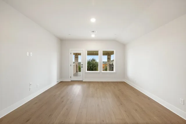 an empty room with a window