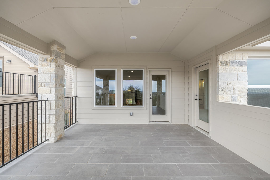 6313 Leftwich Cove Austin, TX 78738 - Photo 19 of 39 a view of a house with a glass door
