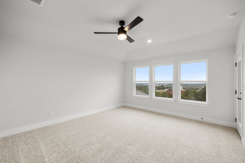 6313 Leftwich Cove Austin, TX 78738 - Photo 21 of 39 an empty room with a window