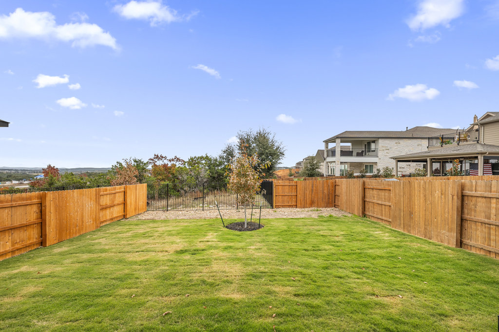 6313 Leftwich Cove Austin, TX 78738 - Photo 33 of 39 a swimming pool with an outdoor seating and a garden