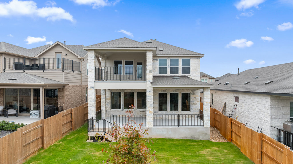 6313 Leftwich Cove Austin, TX 78738 - Photo 34 of 39 a front view of a house with yard