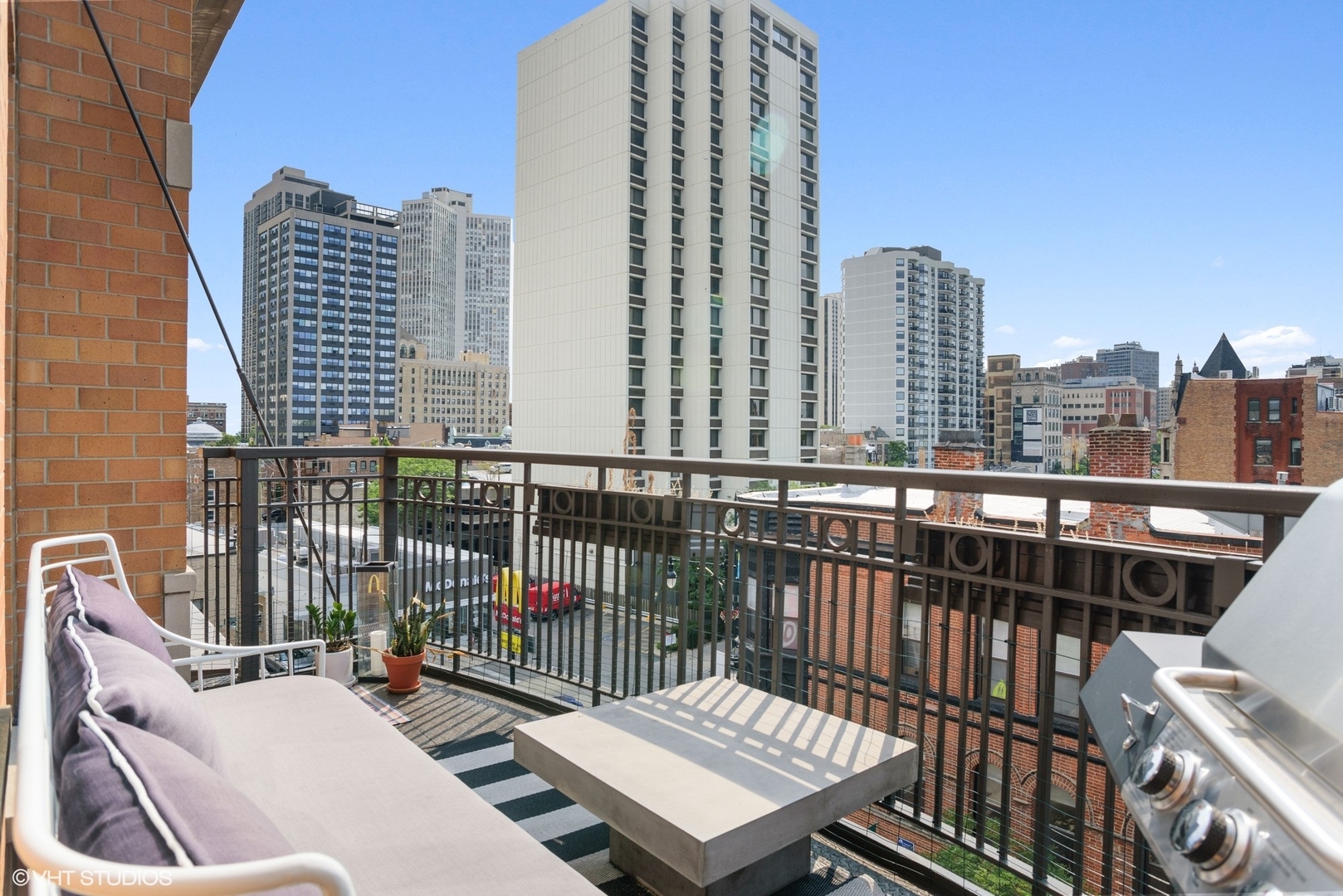 600 West Drummond Place, Unit 511 Chicago, IL 60614 - Photo 16 of 17 a view of balcony with wooden floor