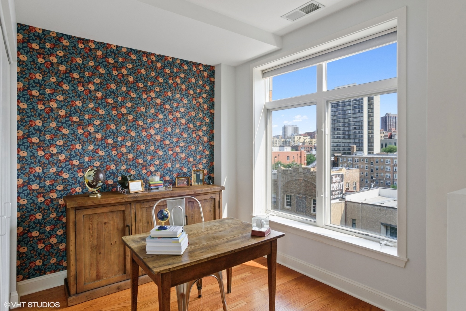 600 West Drummond Place, Unit 511 Chicago, IL 60614 - Photo 9 of 17 a view of a workspace with furniture and a window