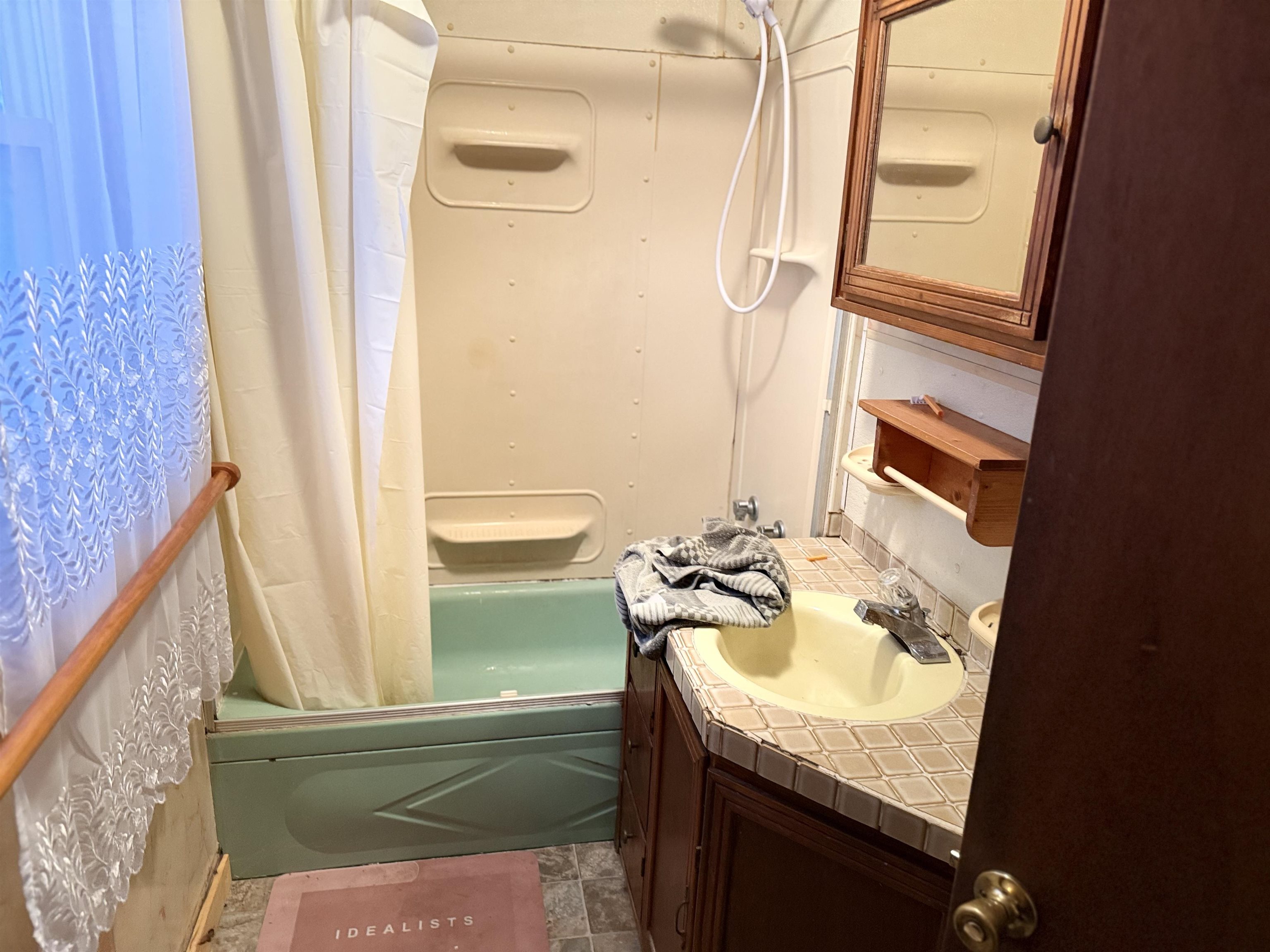 150 West 2nd Street Glidden, WI 54527 - Photo 16 of 32 Bathroom featuring vanity and shower / tub combo