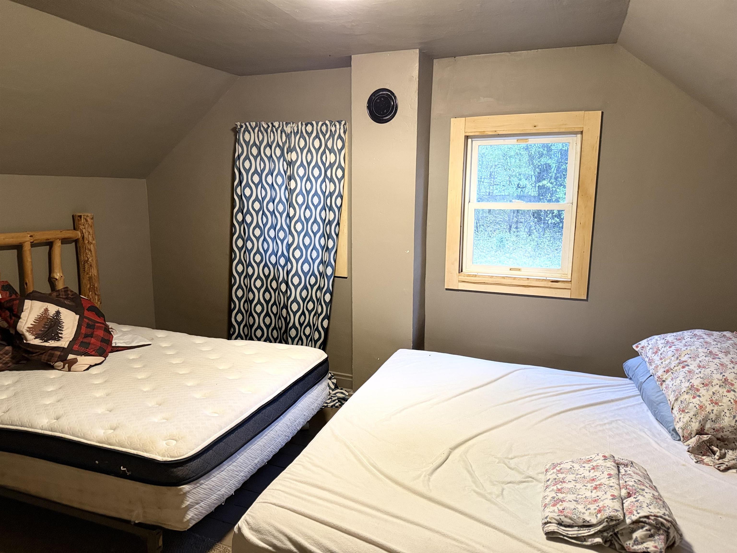 150 West 2nd Street Glidden, WI 54527 - Photo 20 of 32 Bedroom featuring vaulted ceiling