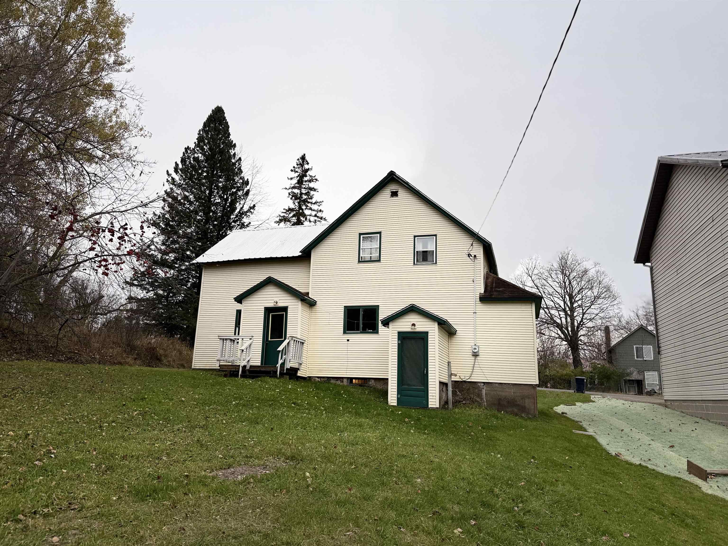 150 West 2nd Street Glidden, WI 54527 - Photo 4 of 32 View of front of home featuring a front yard
