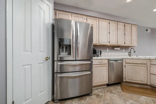 a living room with a couch and a window