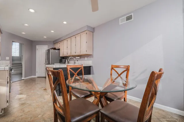 a room with furniture and wooden floor