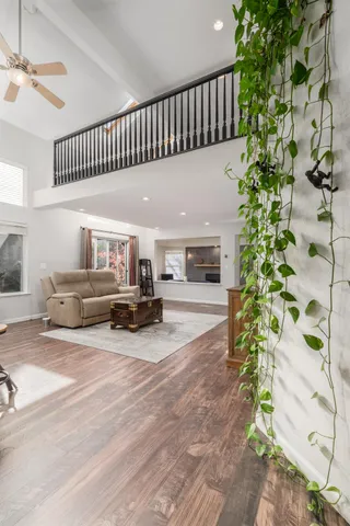 a large bed sitting in a bedroom and dresser