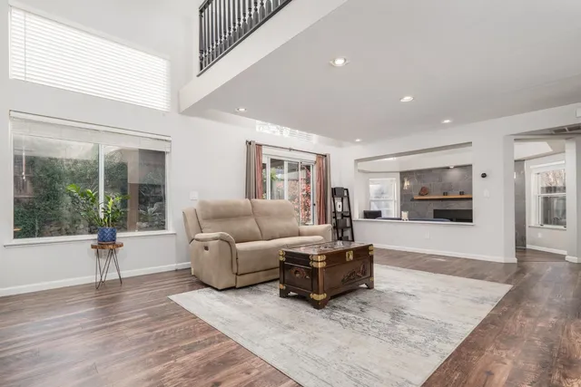 a bathroom with a sink toilet and a mirror