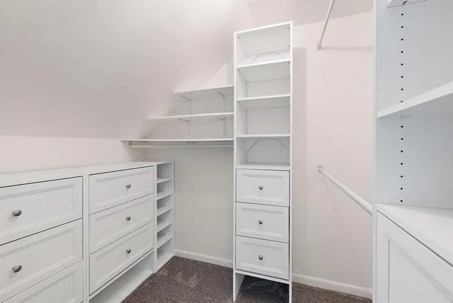 a view of an empty walk in closet
