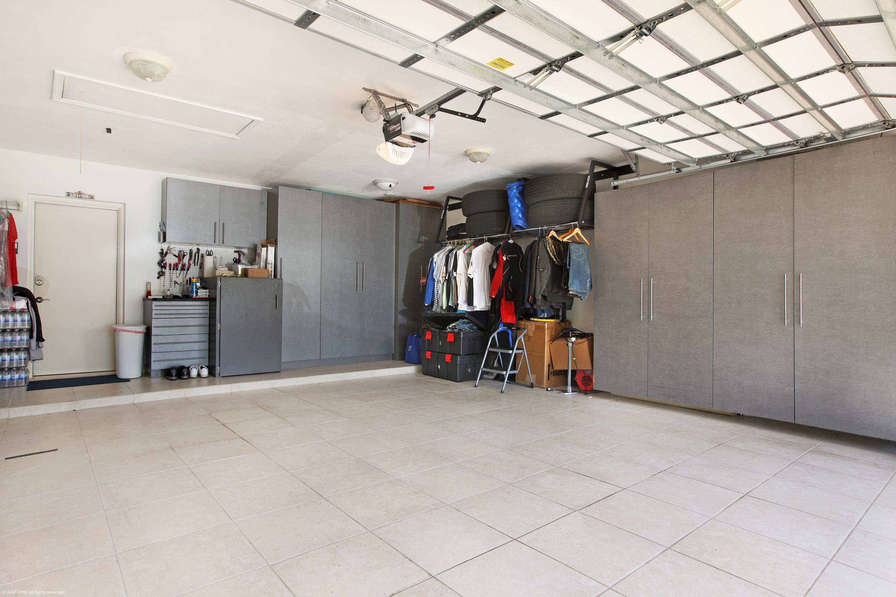 1216 Mulberry Way Boca Raton, FL 33486 - Photo 29 of 38 GARAGE BUILT IN STORAGE/ HAS A/C