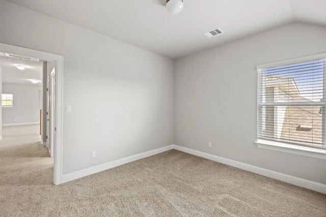 an empty room with a window