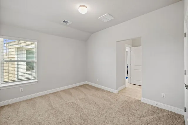 a room with a sink and a window