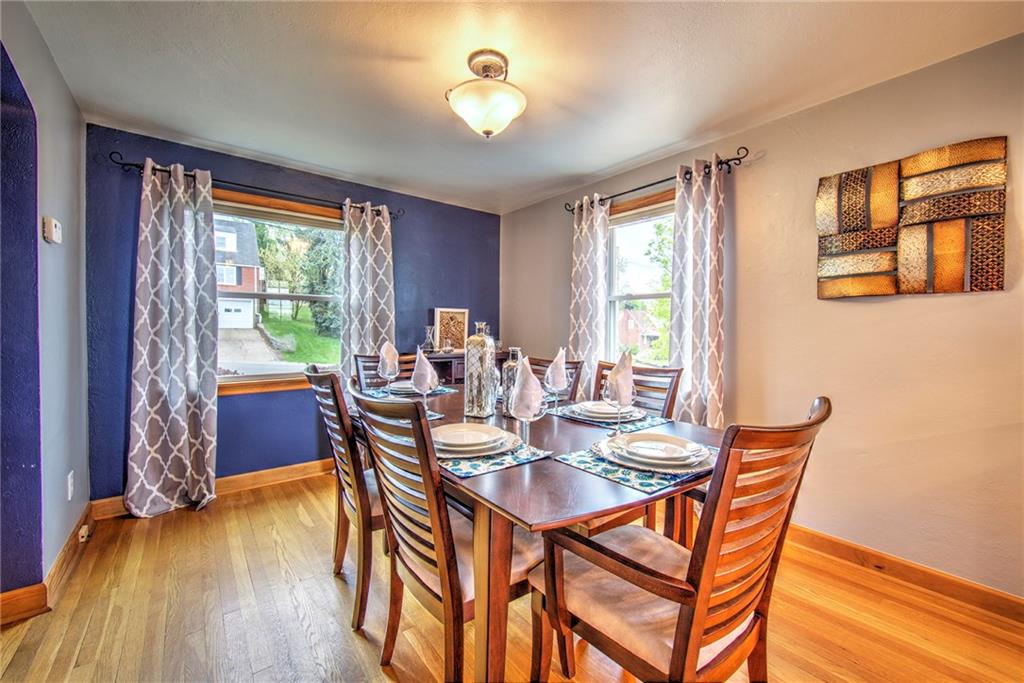 113 Leon Road Green Tree, PA 15220 - Photo 15 of 23 Dining room with natural light and beautiful hardwood floors.