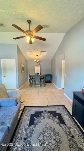 a view of a bathroom with mirror