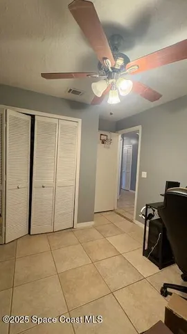 a view of house with swimming pool and outdoor seating