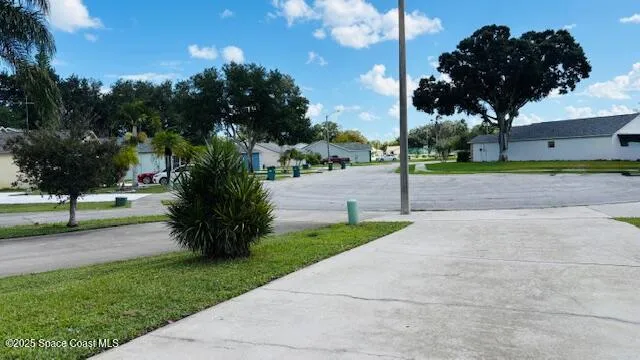 a view of a park with tree s