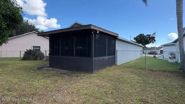 a view of backyard with green space