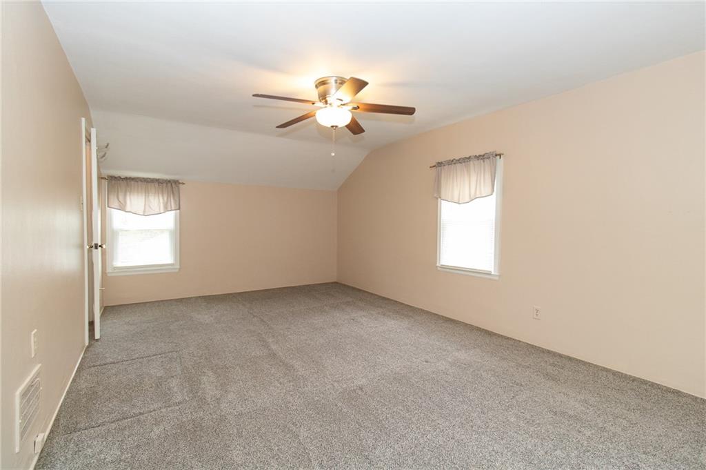 201 Kleber Road Glenshaw, PA 15116 - Photo 19 of 39 an empty room with windows and fan