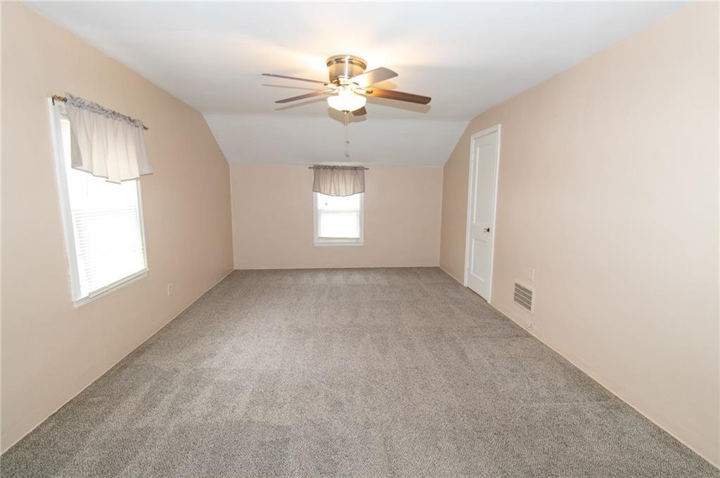 201 Kleber Road Glenshaw, PA 15116 - Photo 20 of 39 a view of an empty room with a window
