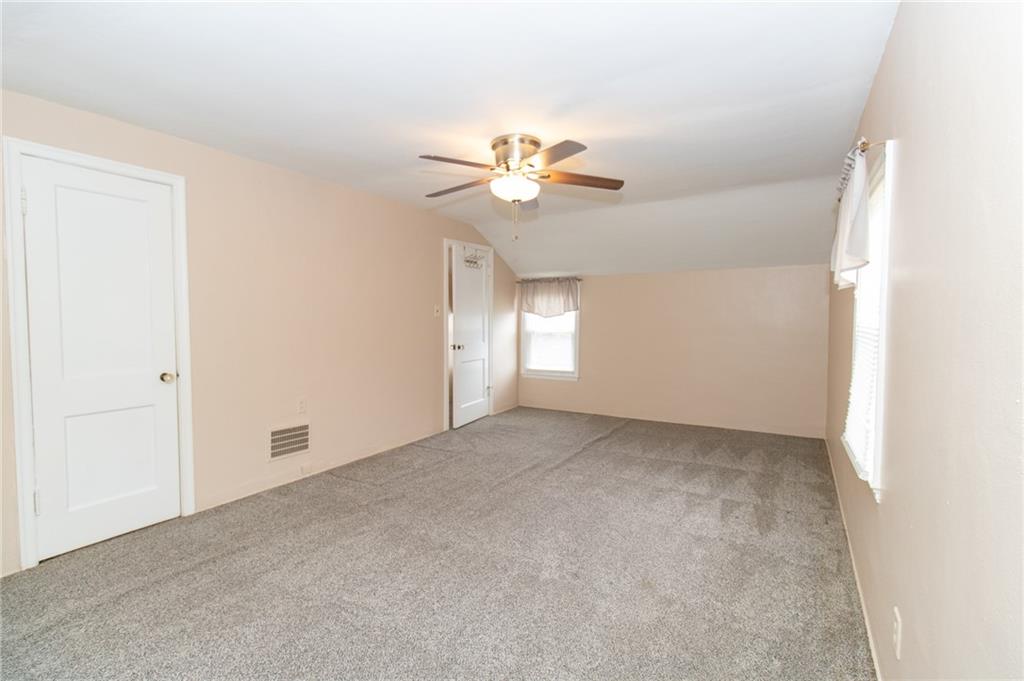 201 Kleber Road Glenshaw, PA 15116 - Photo 22 of 39 a view of an empty room with a window
