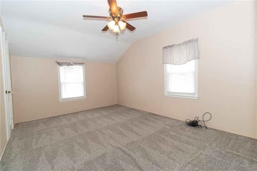 201 Kleber Road Glenshaw, PA 15116 - Photo 24 of 39 an empty room with windows and fan
