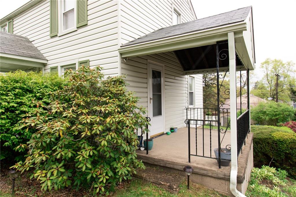 201 Kleber Road Glenshaw, PA 15116 - Photo 32 of 39 a view of a house with a small yard and plants