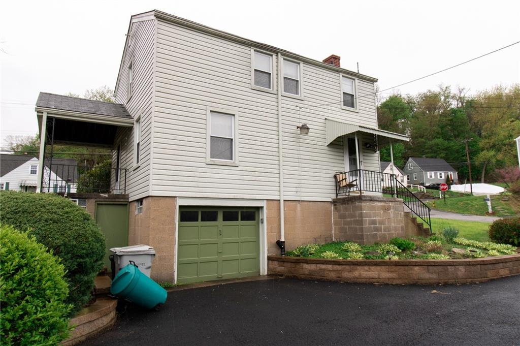 201 Kleber Road Glenshaw, PA 15116 - Photo 36 of 39 a front view of a house with a yard