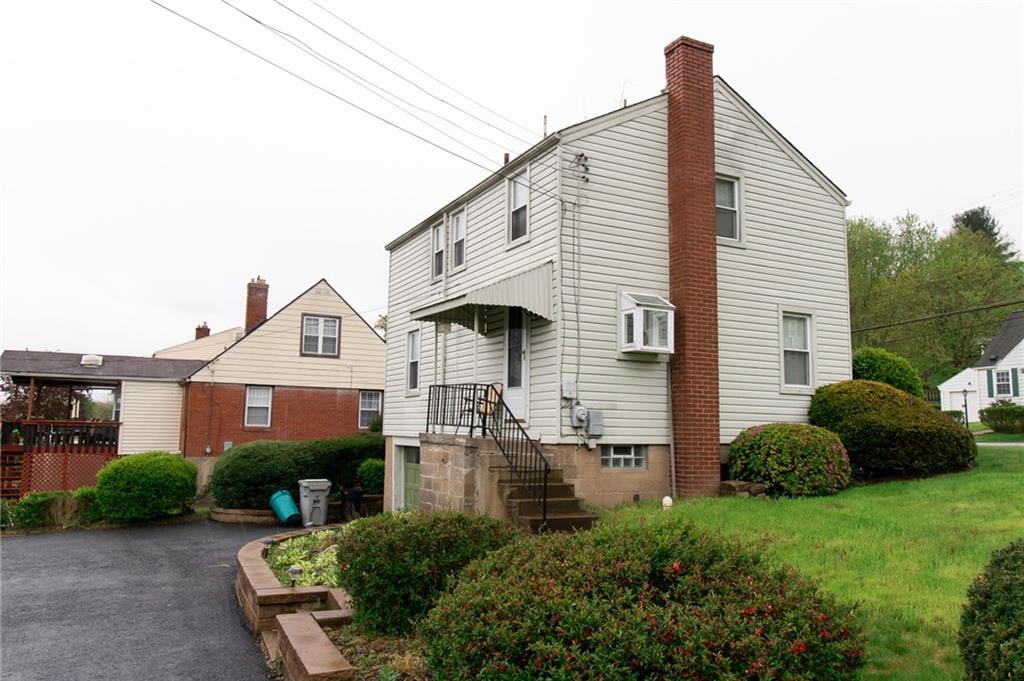 201 Kleber Road Glenshaw, PA 15116 - Photo 37 of 39 a view of a house with a backyard