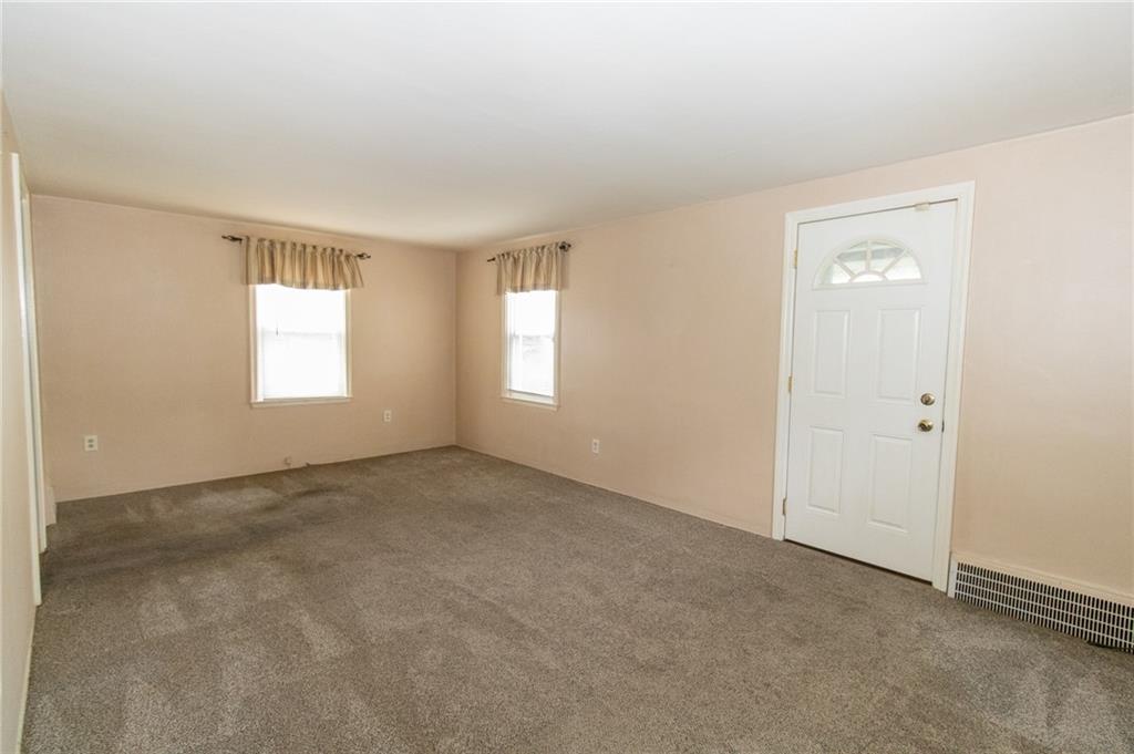 201 Kleber Road Glenshaw, PA 15116 - Photo 4 of 39 an empty room with windows