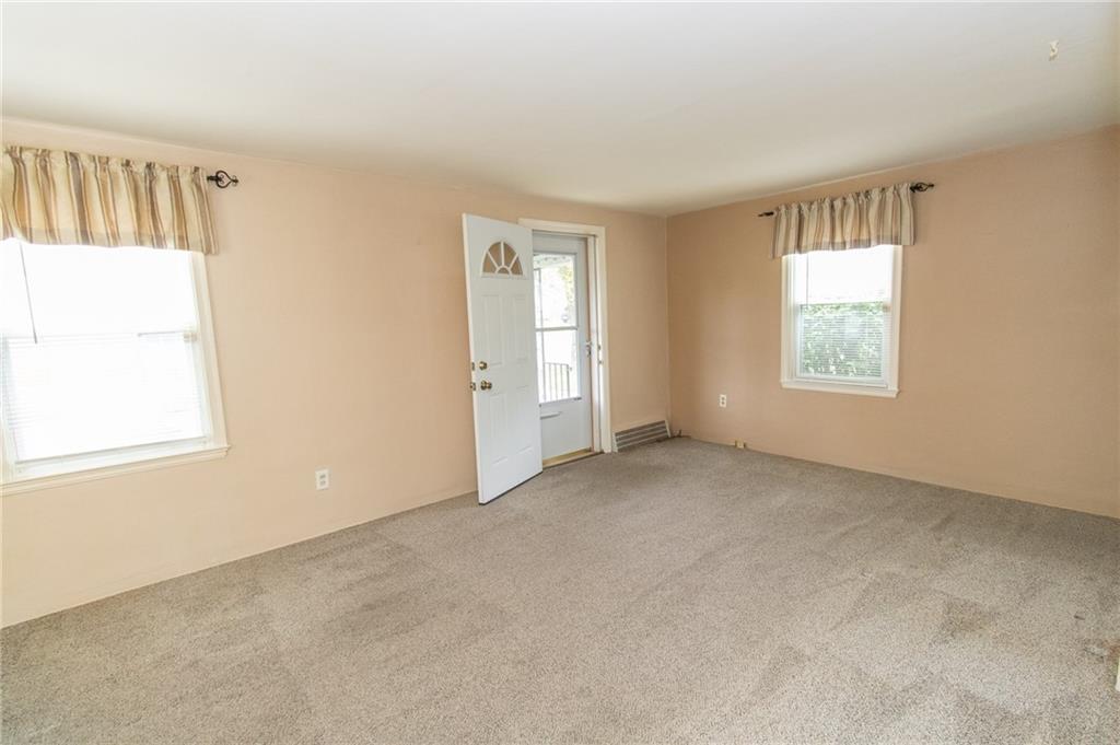 201 Kleber Road Glenshaw, PA 15116 - Photo 5 of 39 an empty room with windows