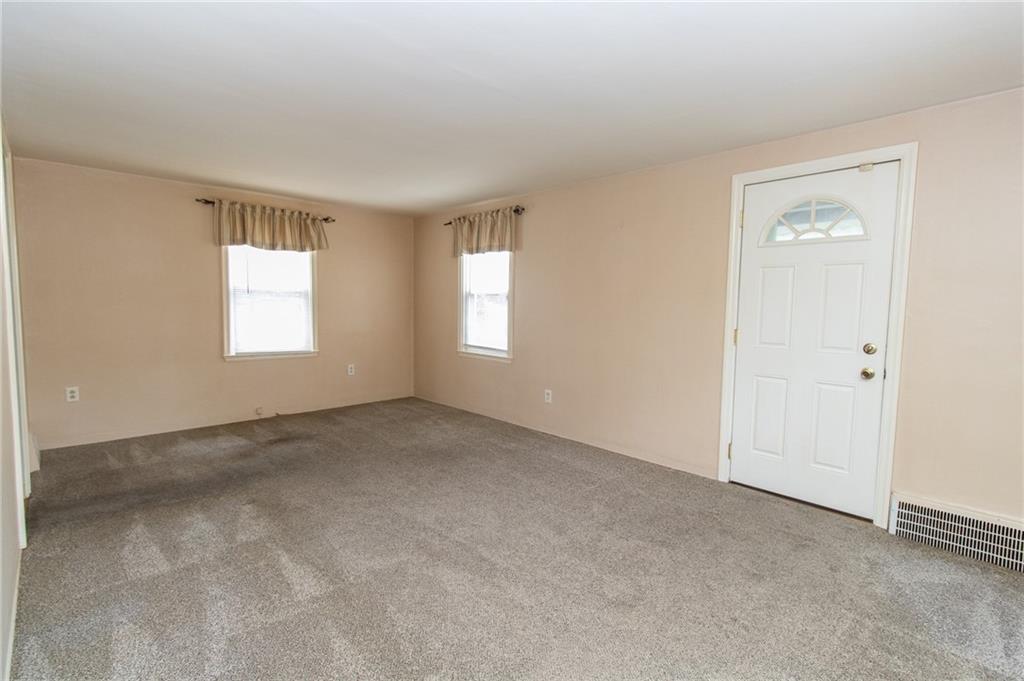 201 Kleber Road Glenshaw, PA 15116 - Photo 7 of 39 an empty room with windows