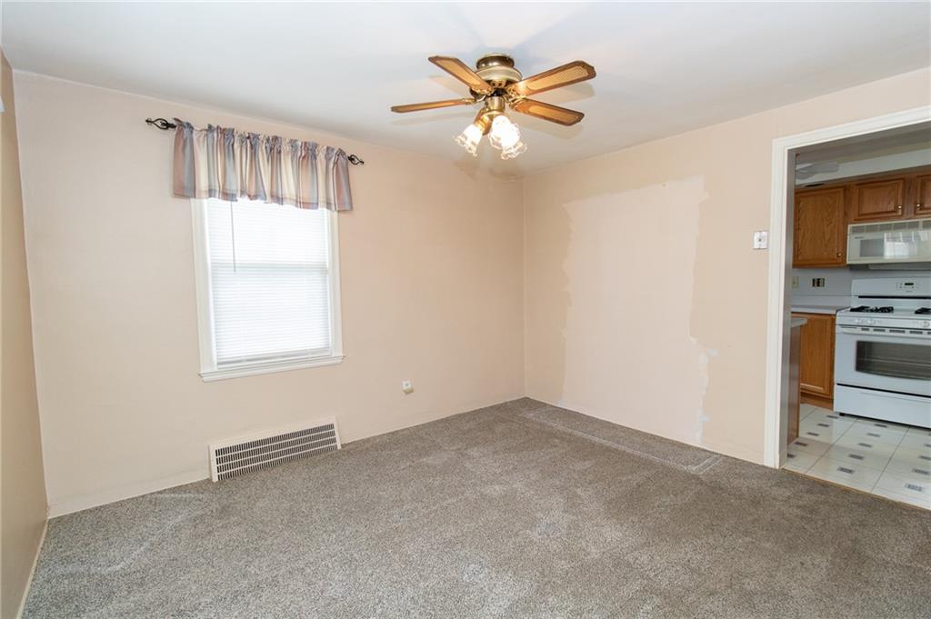201 Kleber Road Glenshaw, PA 15116 - Photo 10 of 39 wooden floor in an empty room with a window