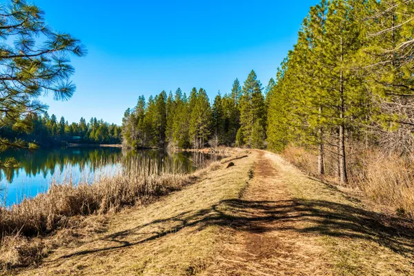 a view of a lake with a yard
