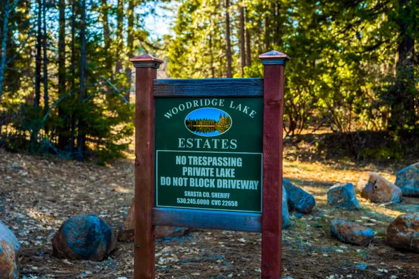 a sign on the side of the road