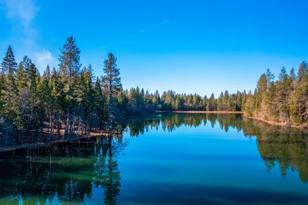 a view of lake with green space