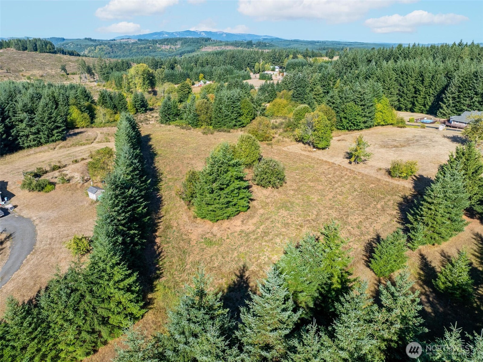 113 Red Rock Lane Chehalis, WA 98532 - Photo 6 of 16 an aerial view of mountain with residential house and lake view