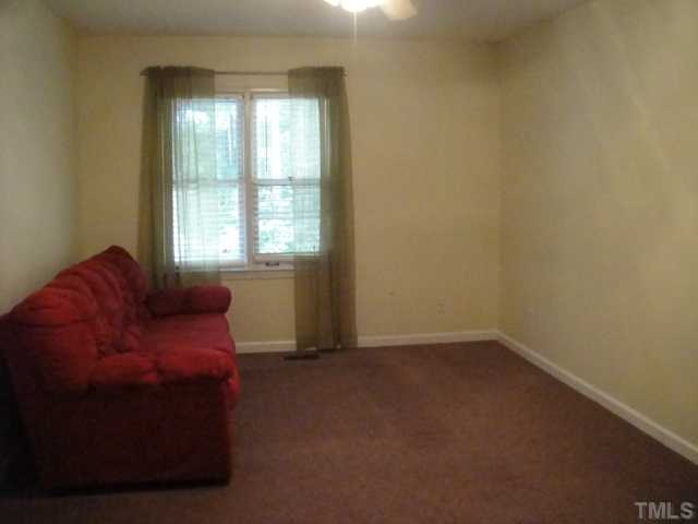 134 Towne View Trail Garner, NC 27529 - Photo 12 of 16 Largest bedroom in the townhome. Can be used as master! Features a walk-in closet, walk-in attic access for additional storage & in-suite tub/shower bath with access also from hallway.